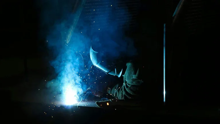 image of a person welding for a blog about oxy acetylene