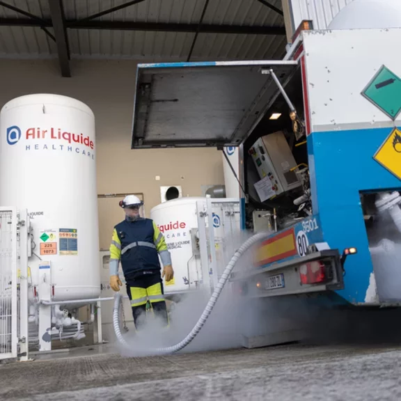 Technician filling a tank 07